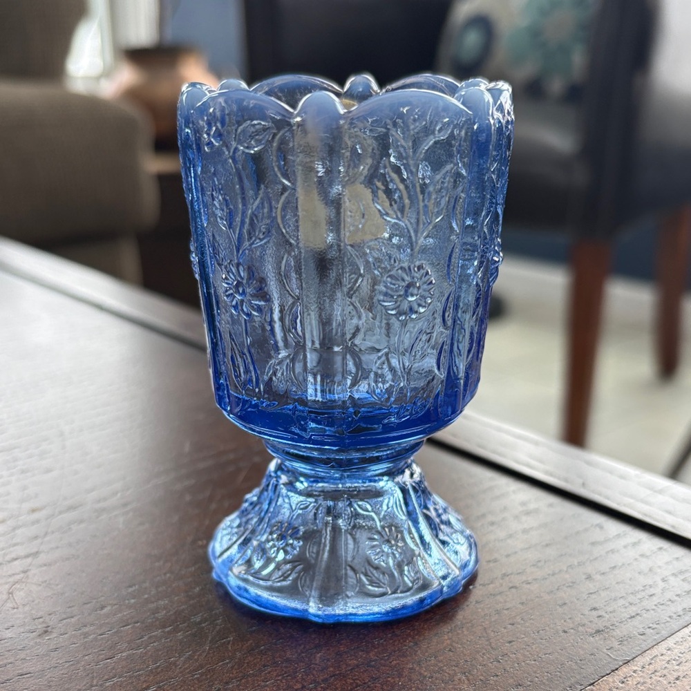 Vintage Fenton blue opalescent paneled daisy votive candle holder.
